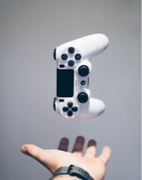 Game controller falling into the hand of the player.